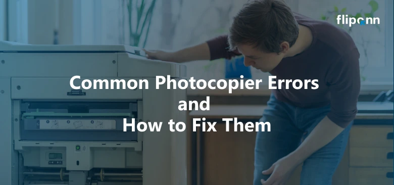 Man troubleshooting a photocopier Common photocopier errors and how to fix them